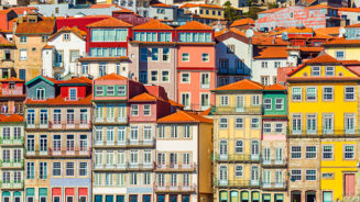 Old historical houses of Porto. Rows of colorful buildings in the traditional architectural style, Portugal.