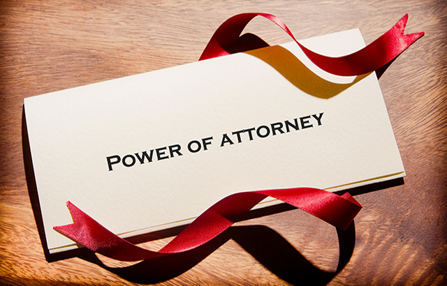 Still Life Of Power Of Attorney Document On Desk